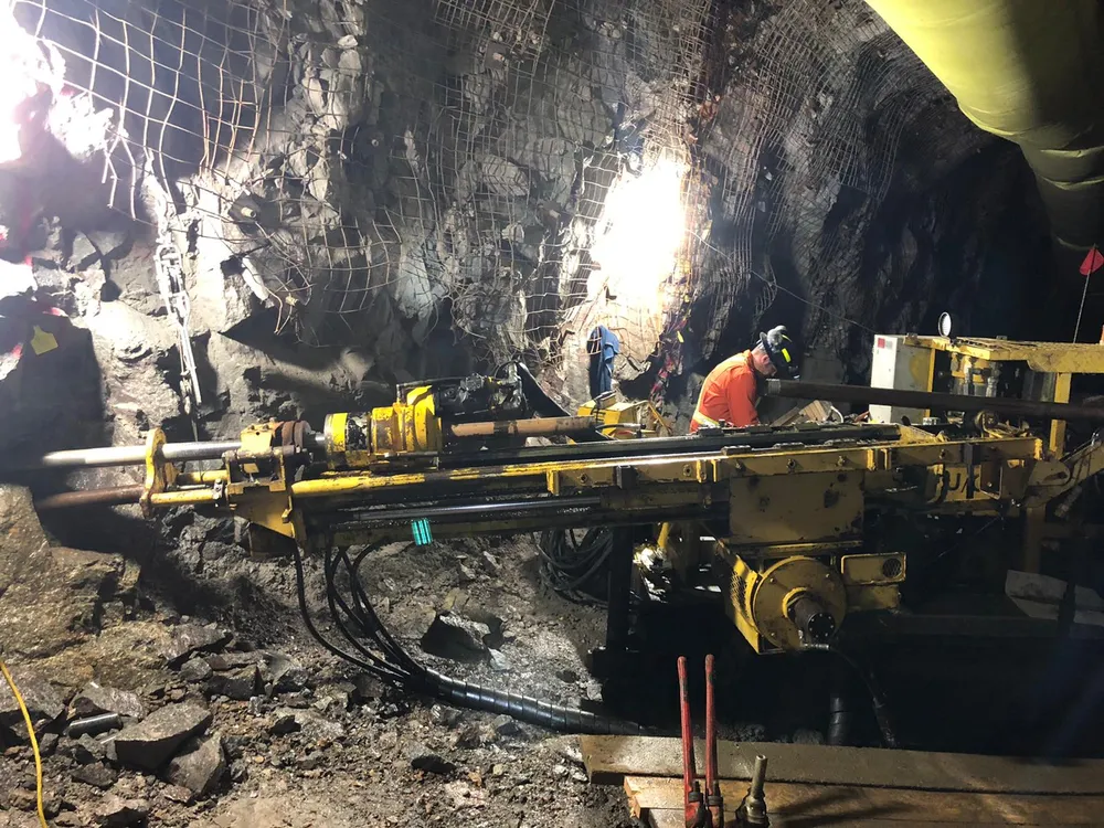 Driller operating an underground diamond drill rig