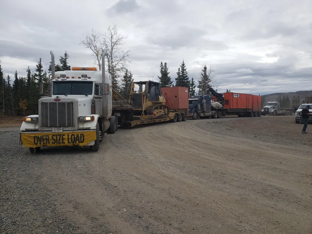 Paycore truck moving a drill rig